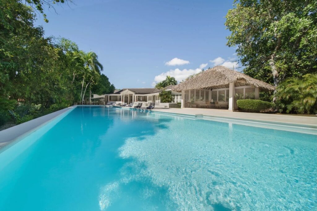 Long pool and gazebo at a Cacique villa, Casa de Campo