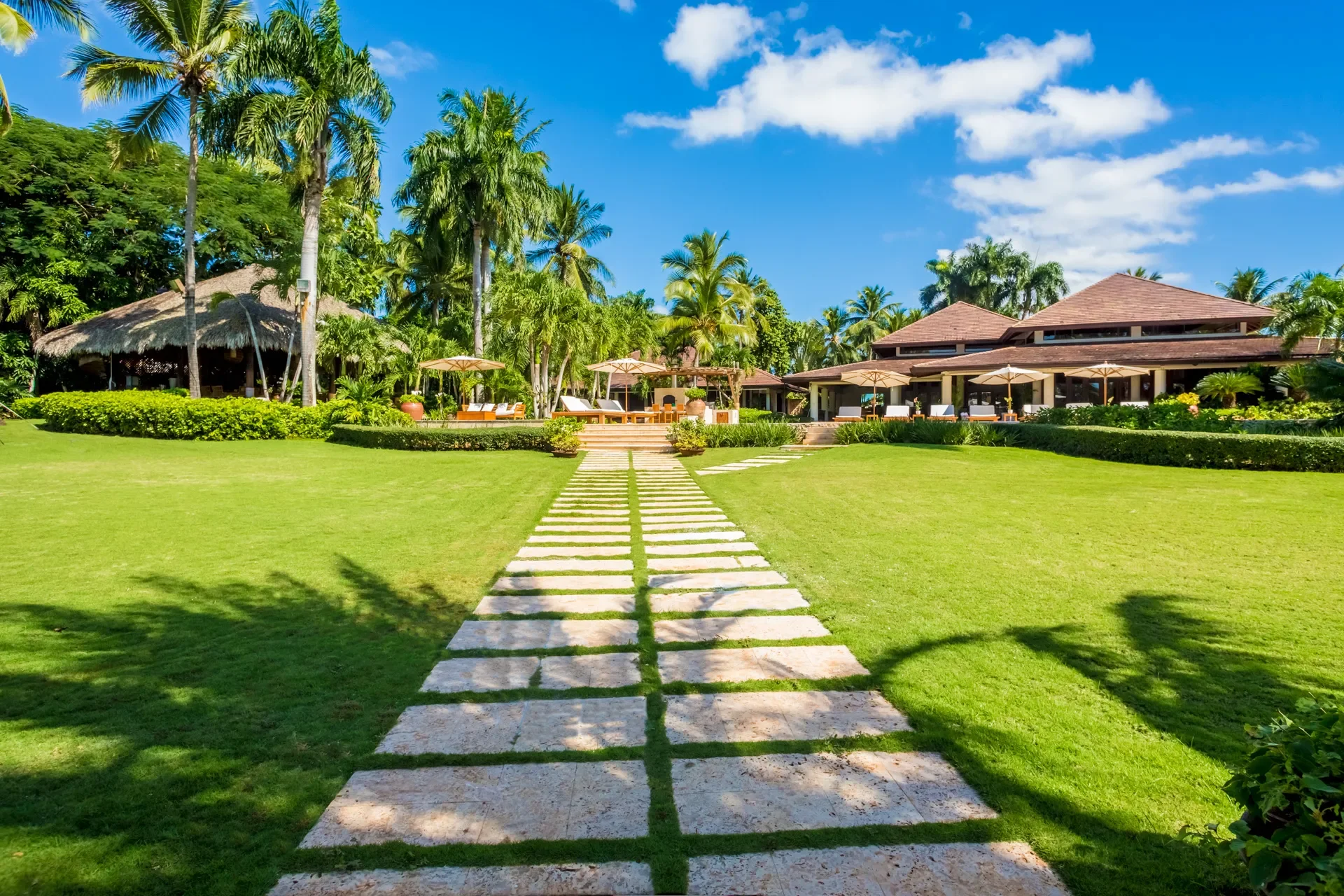 Garden path at Bahía Minitas 6, a CPH villa — Casa de Campo® Resort, Dominican Republic