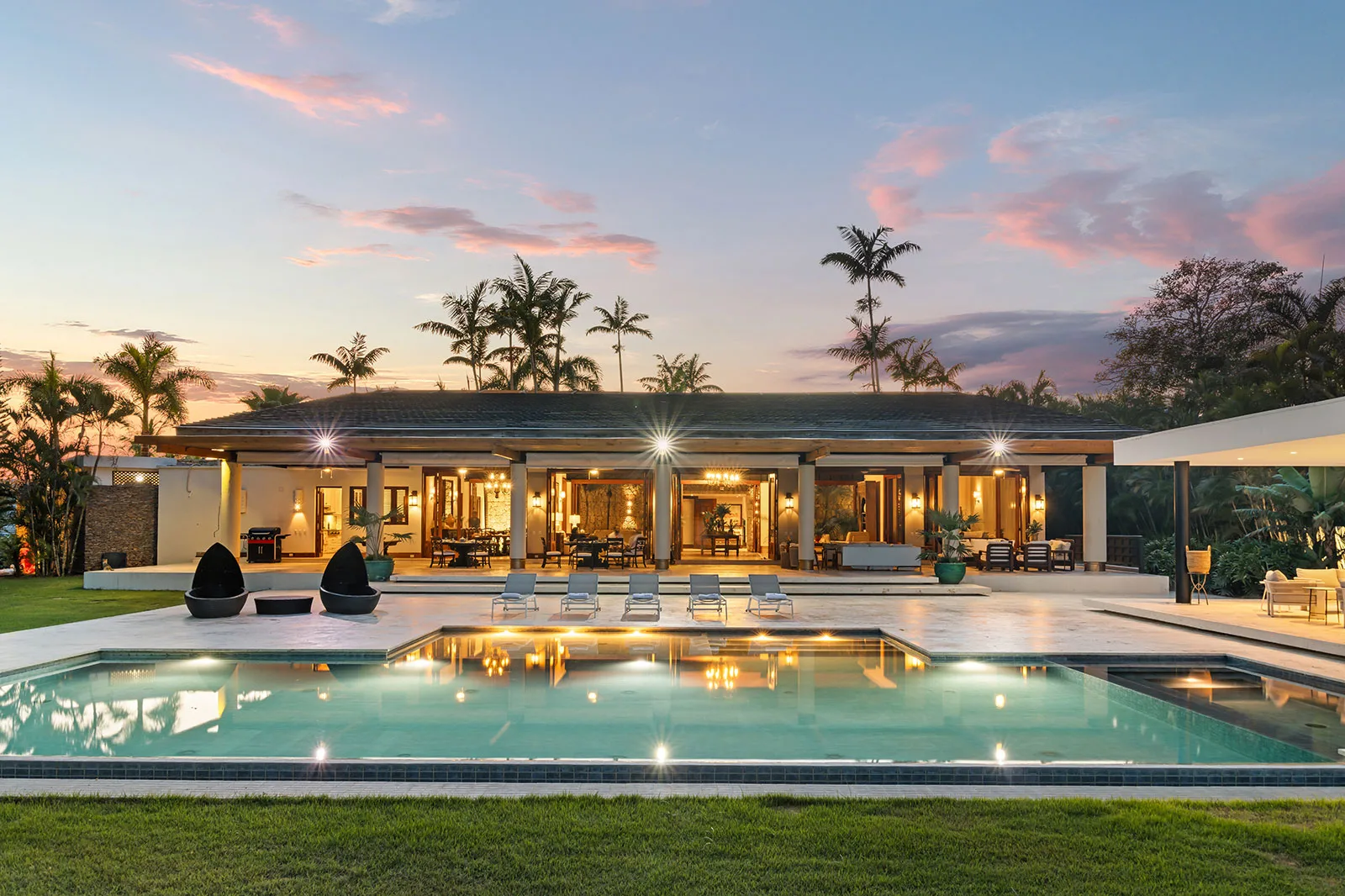 El Batey 11 villa and pool at dusk, Casa de Campo®