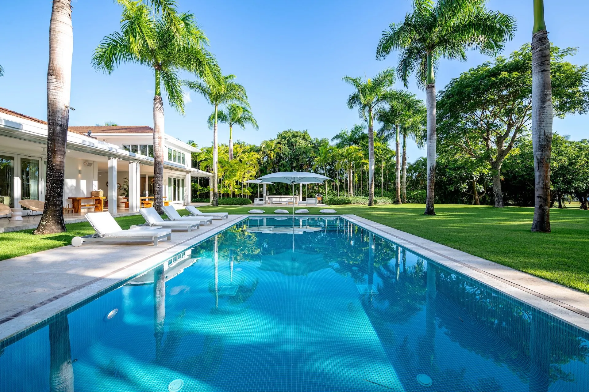 Pool and lawn at Las Palmas 11, a CPH villa — Casa de Campo® Resort, Dominican Republic