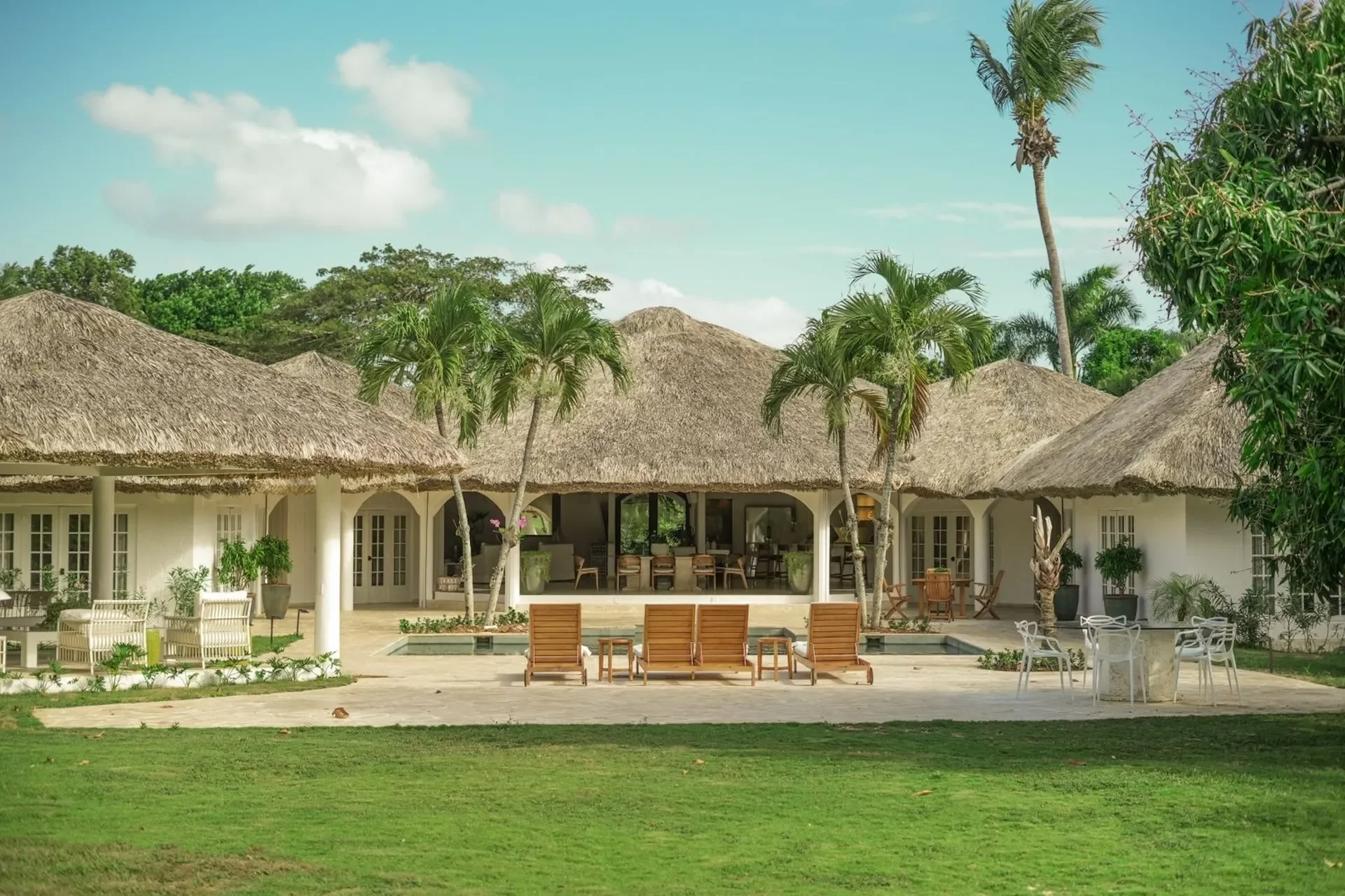 Lawn and villa at Los Naranjos 6, a CPH villa — Casa de Campo® Resort, Dominican Republic