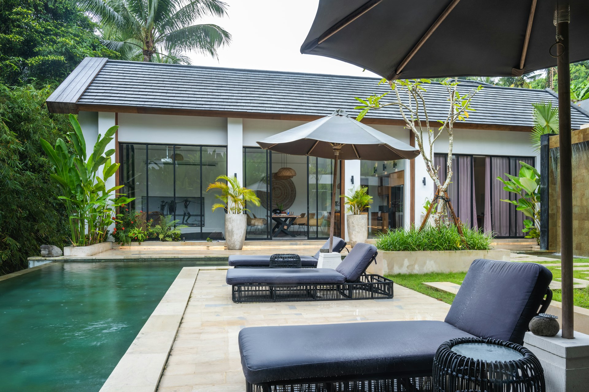 Villa with a pool and lawn
