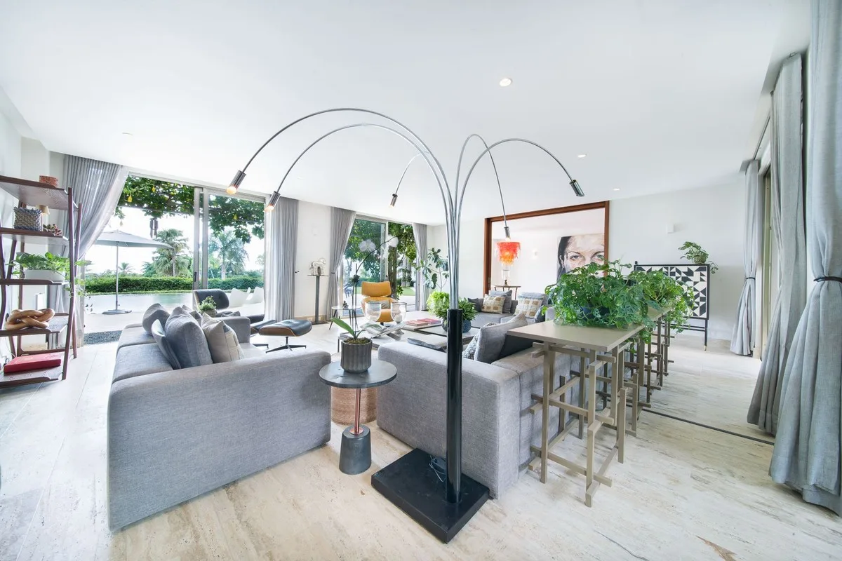 Living area with bar seating and floor-to-ceiling windows, Barranca 17, Barranca, Casa de Campo®
