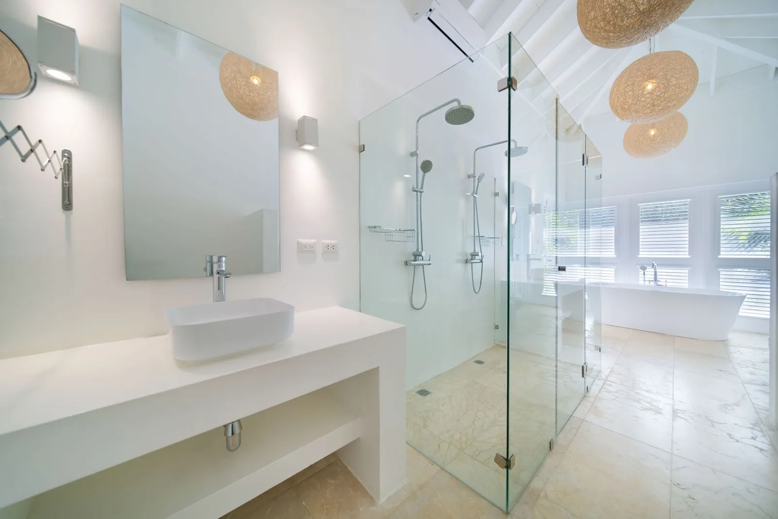 En-suite bathroom with glass shower and stone vanity, Cacique 26, Cacique, Casa de Campo®