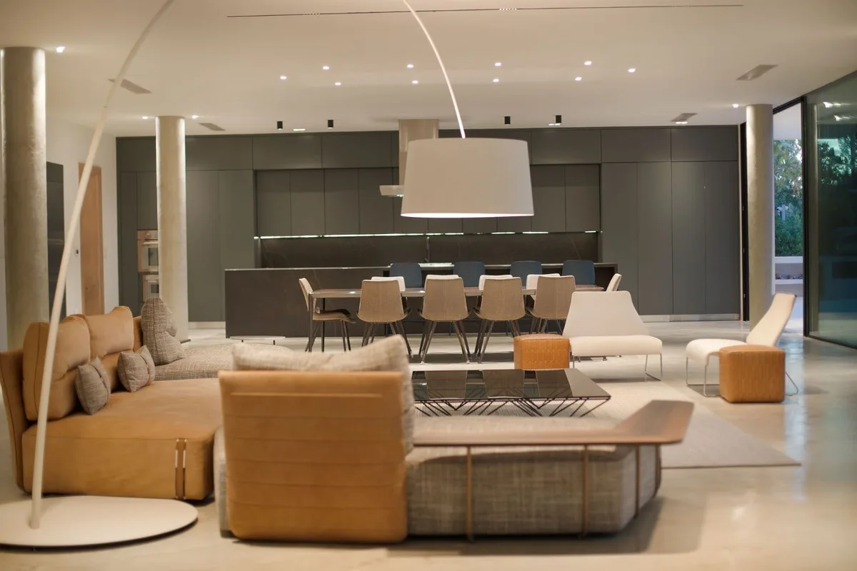 Living room with arc lamp and dining area beyond, El Valle 6, El Valle, Casa de Campo®