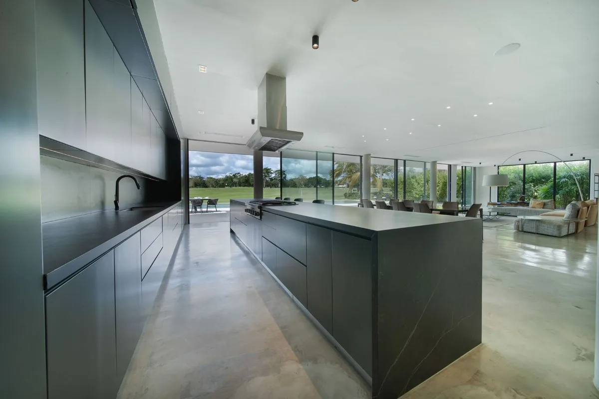 Kitchen with long dark island and golf views, El Valle 6, El Valle, Casa de Campo®