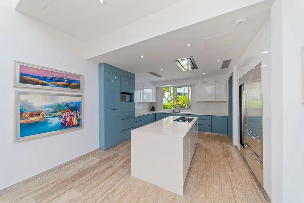 Chef’s kitchen with island and artwork, La Vereda 26, La Vereda, Casa de Campo®