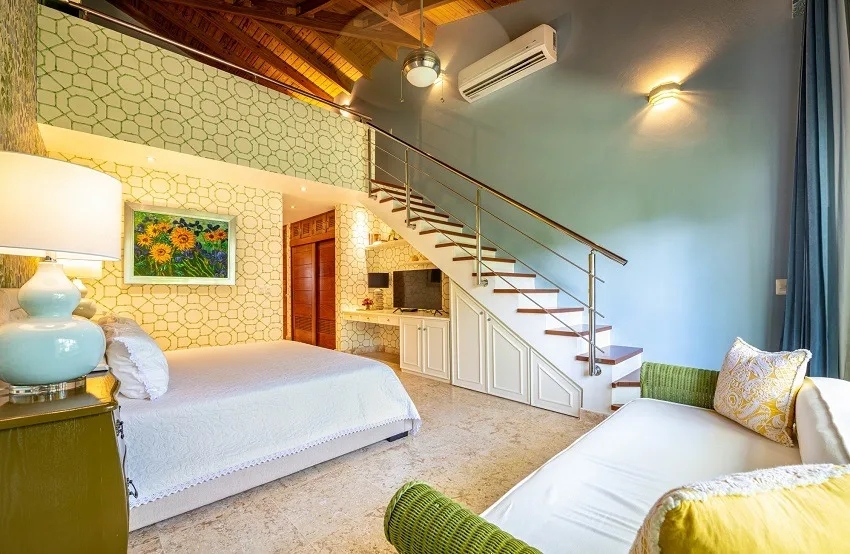 Bedroom with staircase to the mezzanine level, Las Cañas I 37, Las Cañas, Casa de Campo®