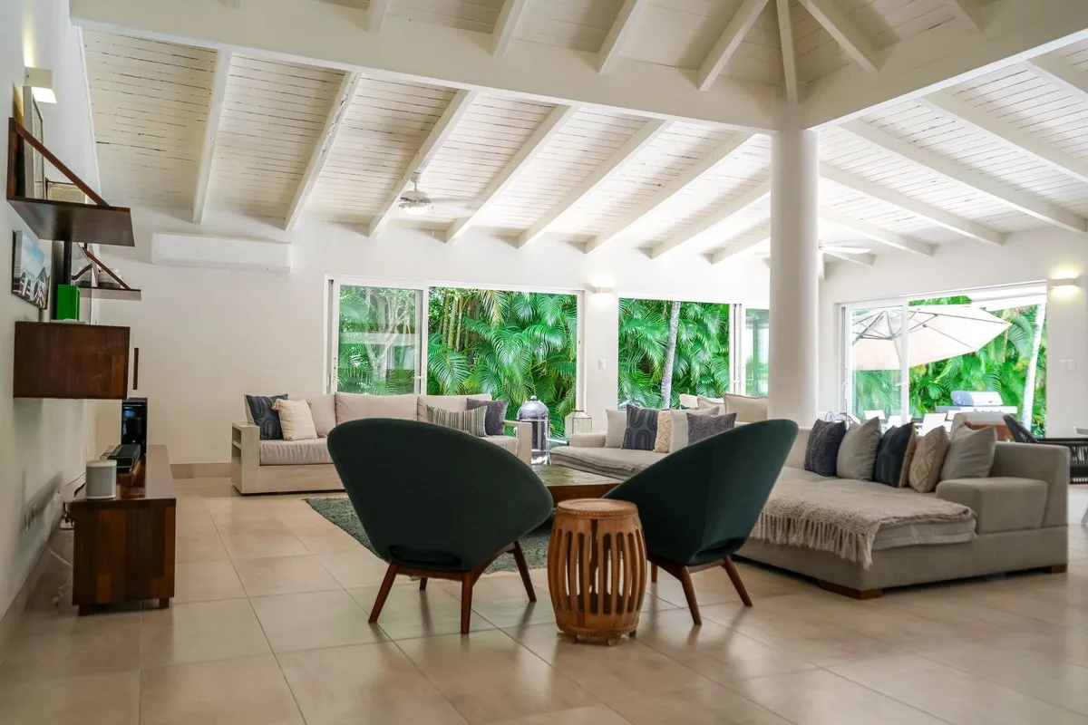 Living room under a white beamed ceiling, Los Lagos 64, Los Lagos, Casa de Campo®