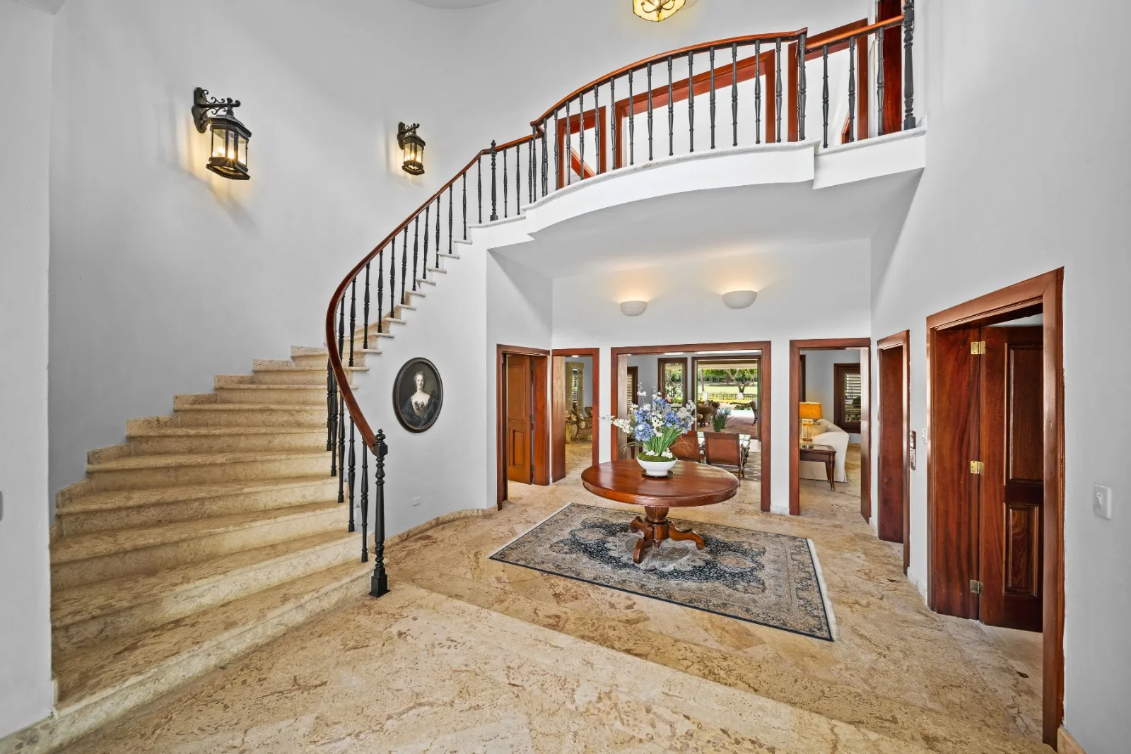 Entrance hall with curved staircase, Punta Aguila 52, Punta Aguila, Casa de Campo®