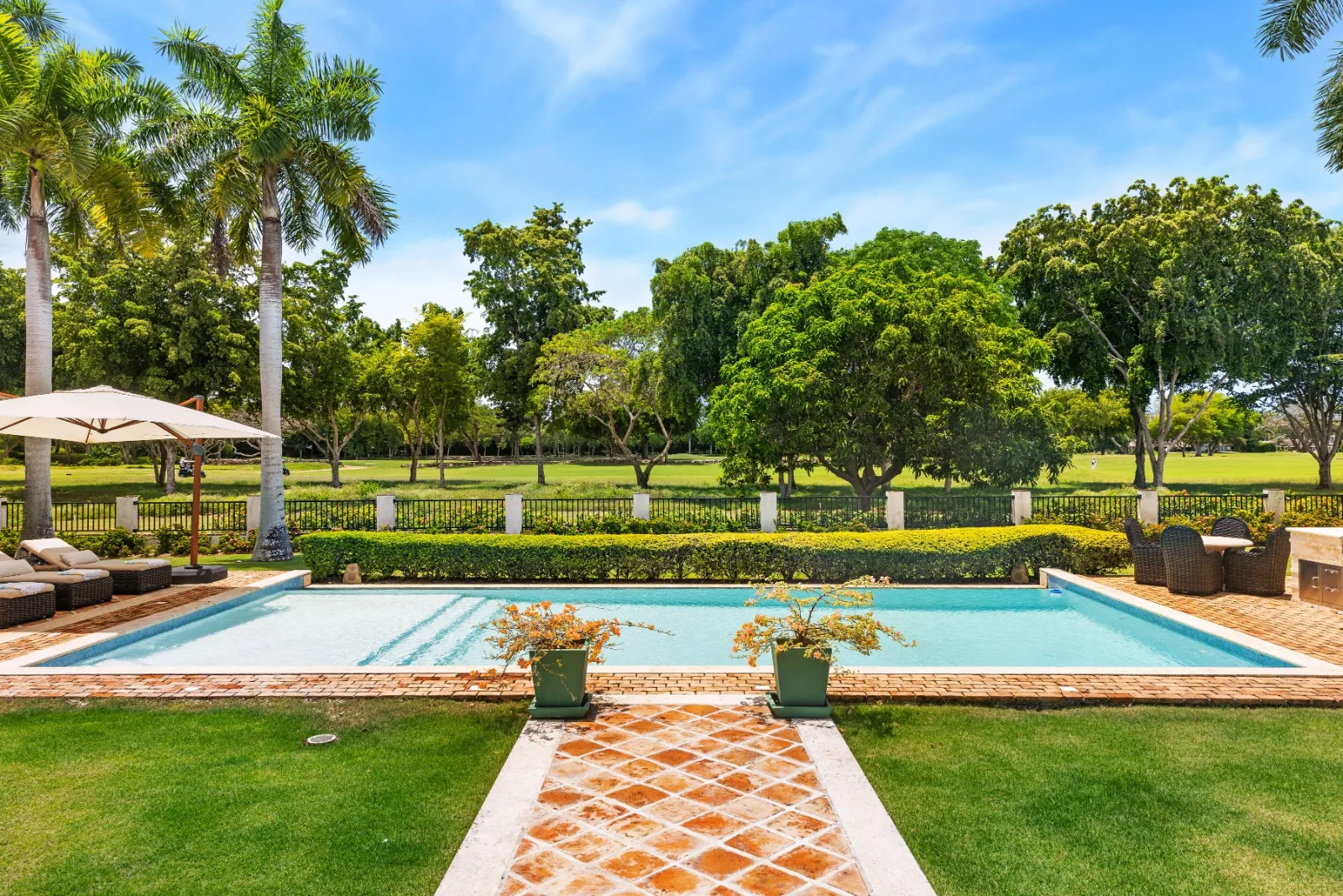 Pool with brick walkway and lawns, Punta Aguila 52, Punta Aguila, Casa de Campo®