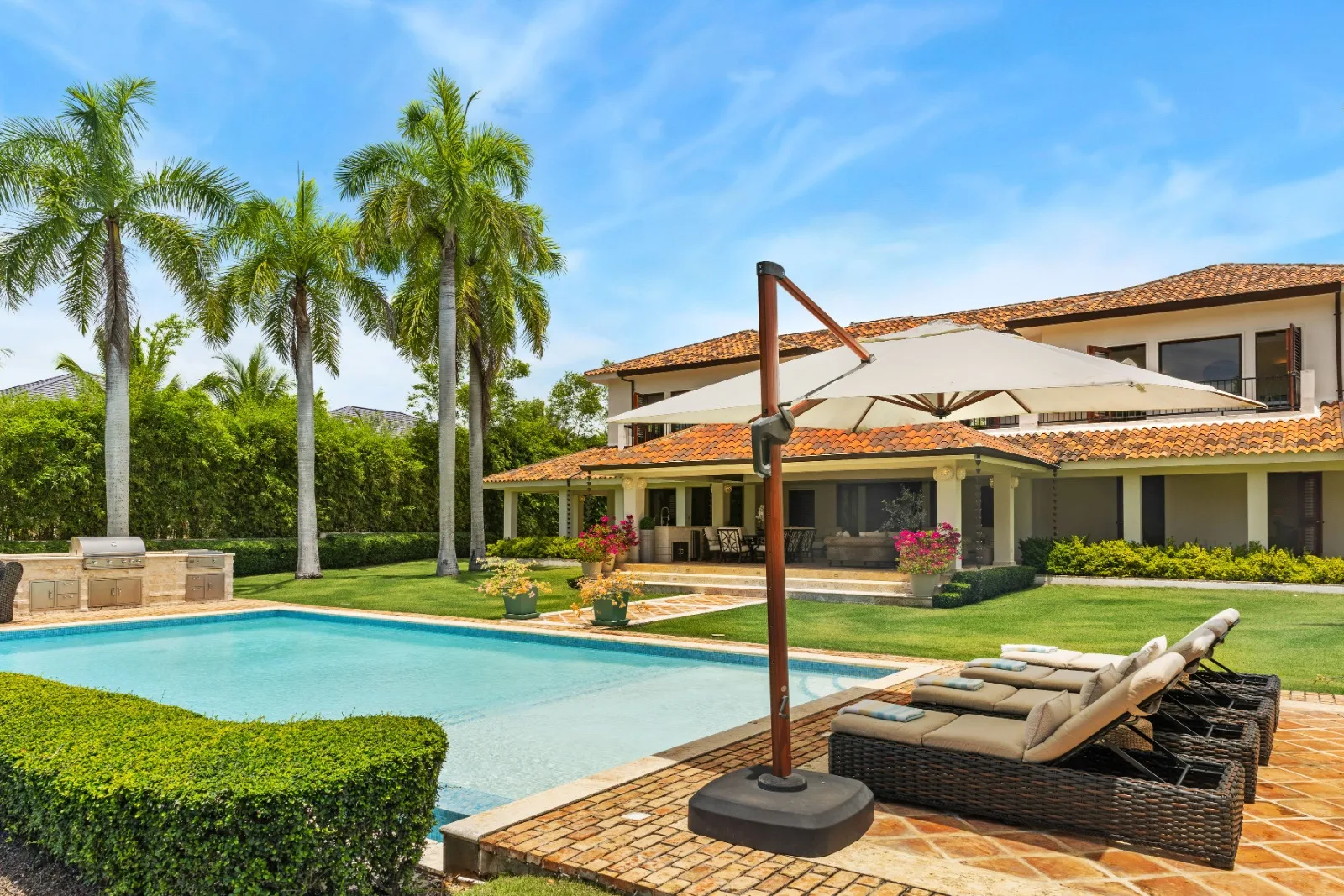 Pool corner with umbrella and sun loungers, Punta Aguila 52, Punta Aguila, Casa de Campo®