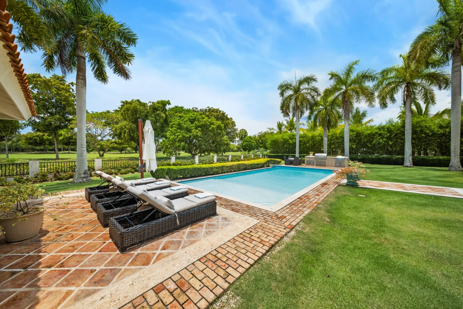 Pool deck with loungers on brick paving, Punta Aguila 52, Punta Aguila, Casa de Campo®