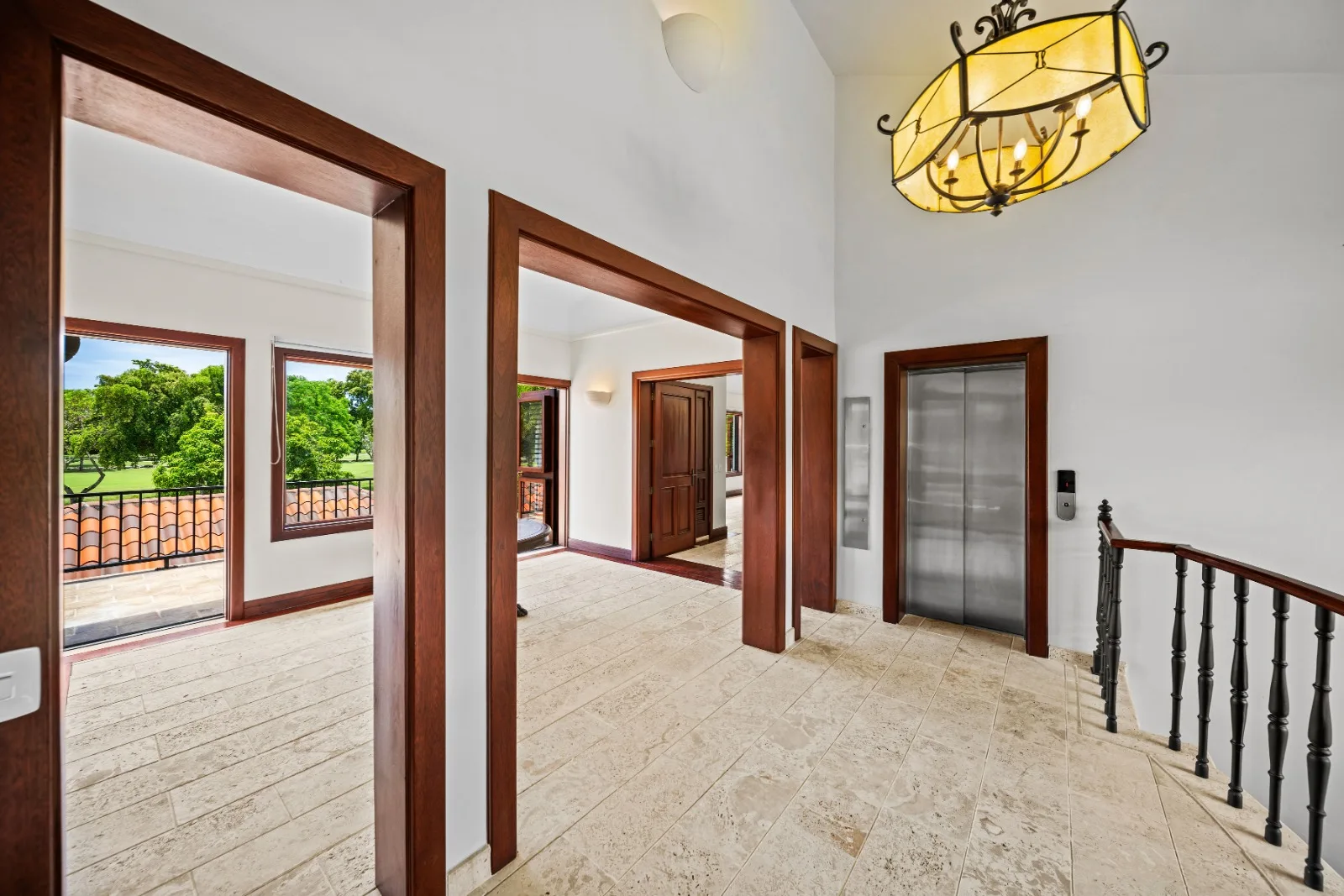 Upper hallway with lantern and garden windows, Punta Aguila 52, Punta Aguila, Casa de Campo®