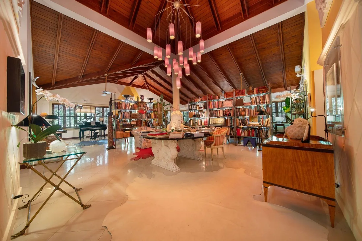 Living area under a high timber ceiling with chandelier, Rancho Arriba 30, Rancho Arriba, Casa de Campo®