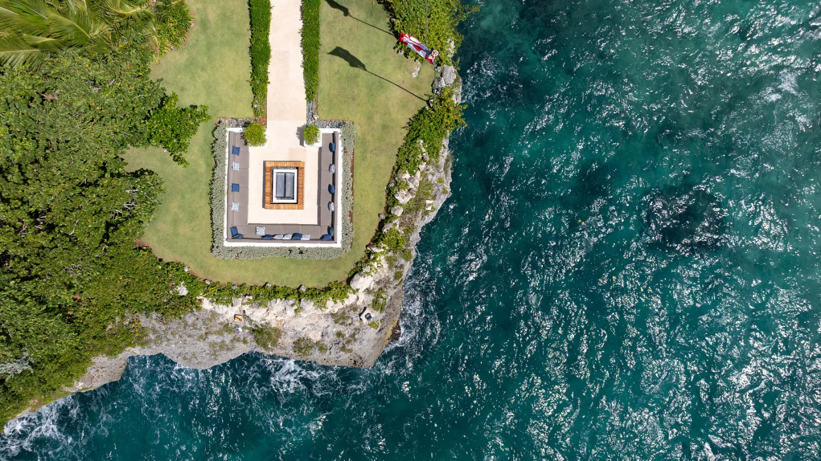 Aerial view of the clifftop garden and turquoise sea, Villa Farallón, Punta Aguila, Casa de Campo®