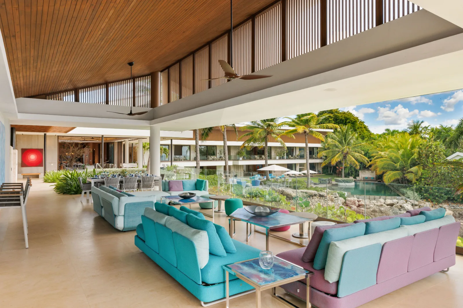 Open living room under a timber ceiling with garden views, Villa Farallón, Punta Aguila, Casa de Campo®