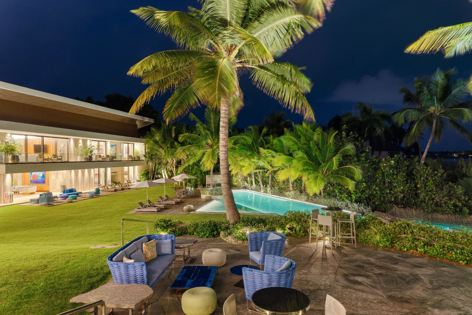 Garden lounge and pool lit at night, Villa Farallón, Punta Aguila, Casa de Campo®