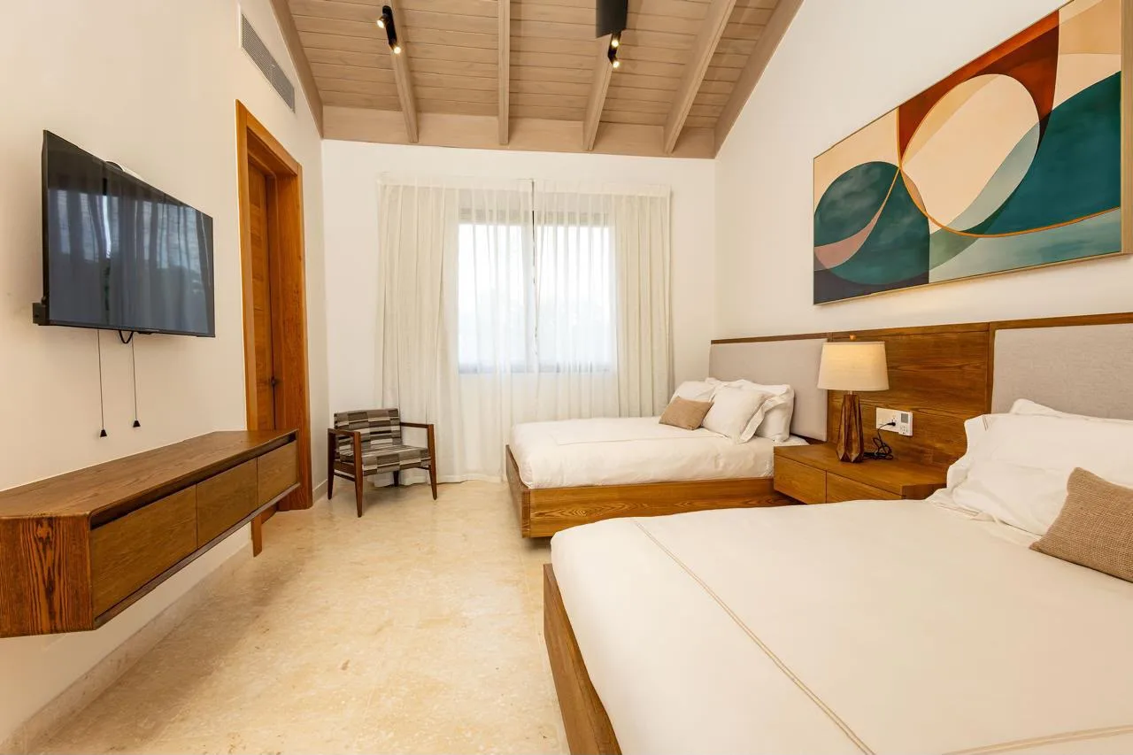 Bedroom with sitting area and artwork, Barranca Este 14, Barranca Este, Casa de Campo®