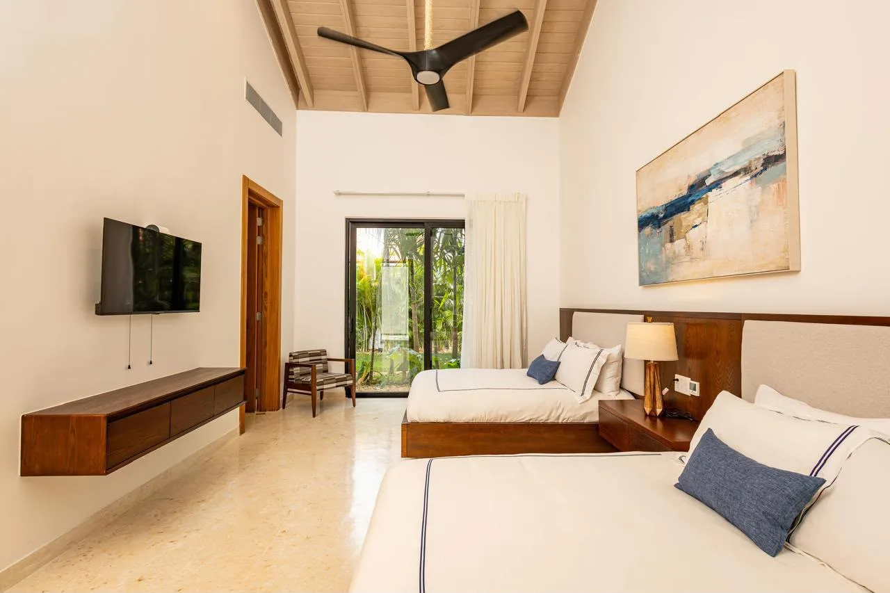 Bedroom with garden-view doors, Barranca Este 14, Barranca Este, Casa de Campo®