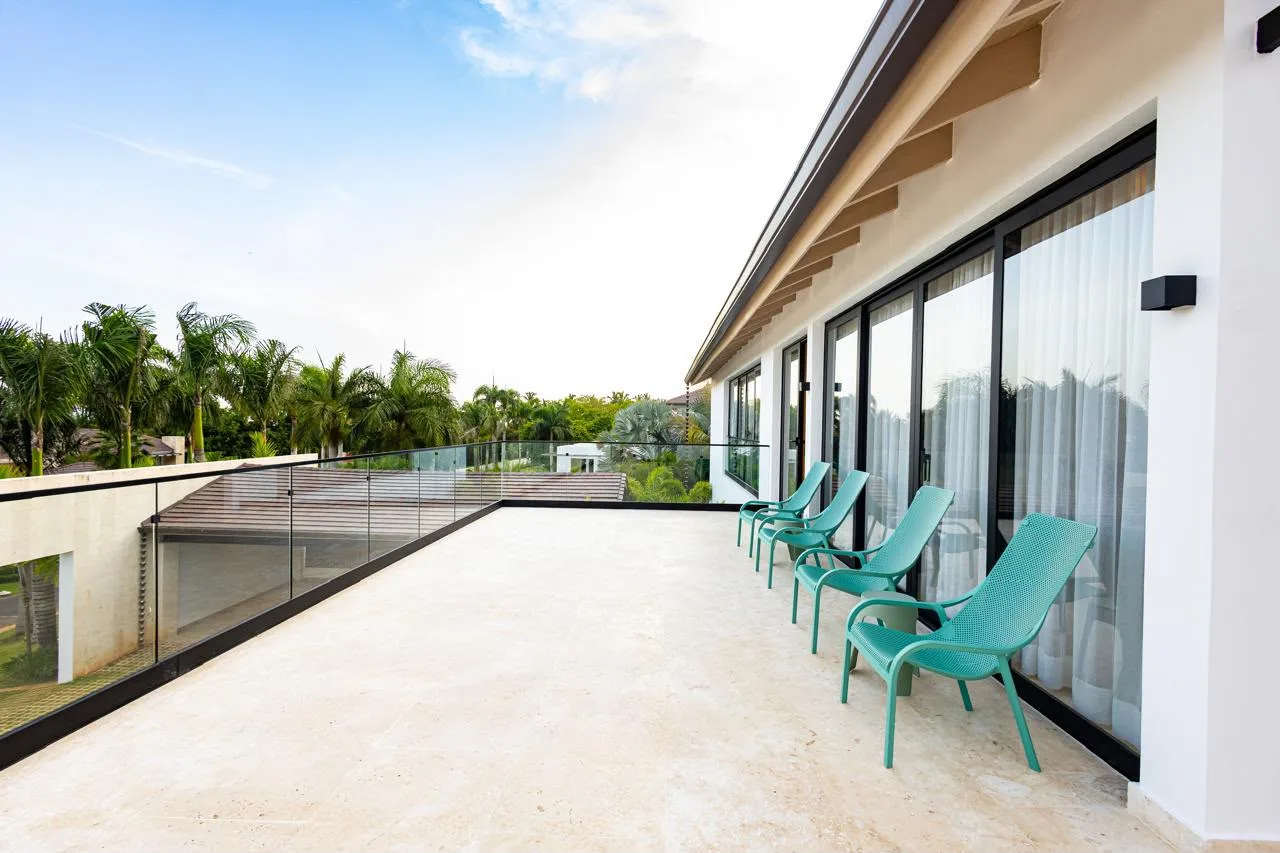 Upper terrace with lounge chairs and garden views, Barranca Este 14, Barranca Este, Casa de Campo®